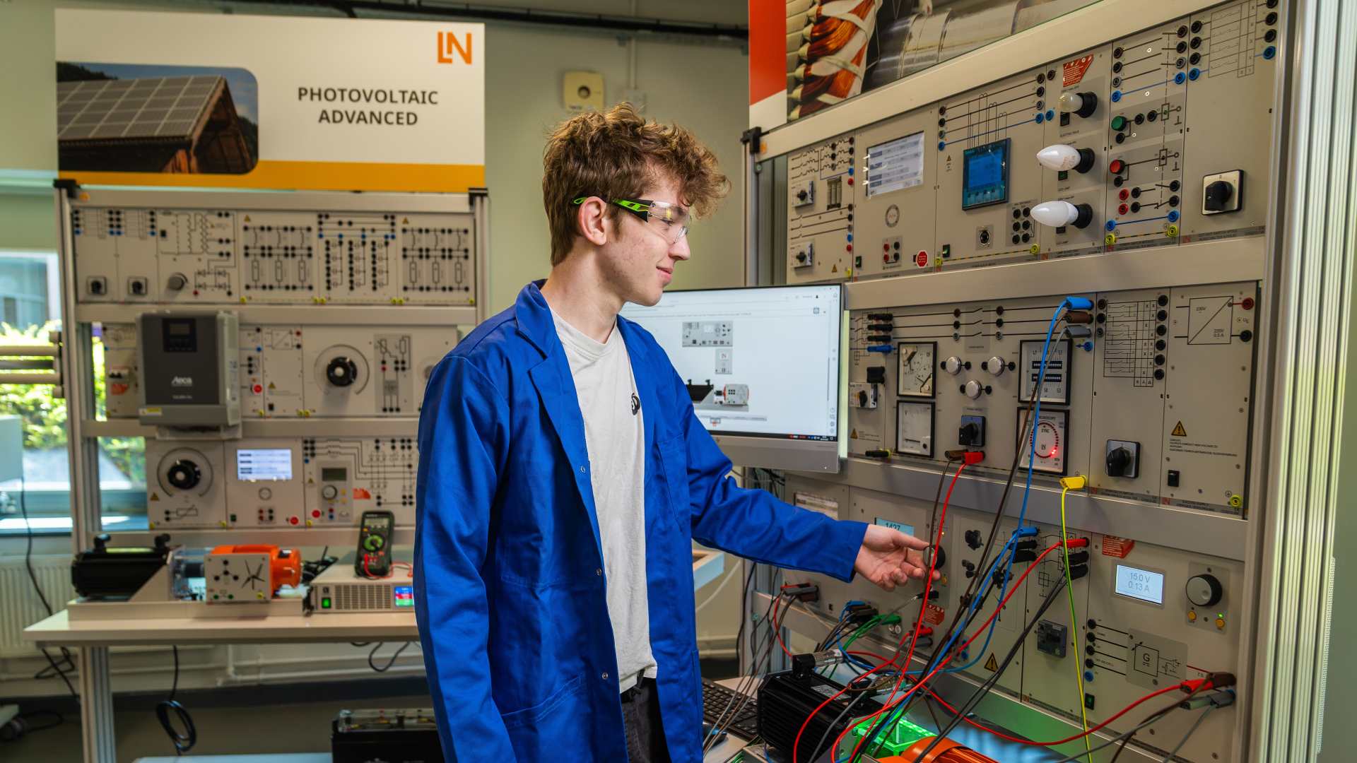 A student using equipment in the engineering lab