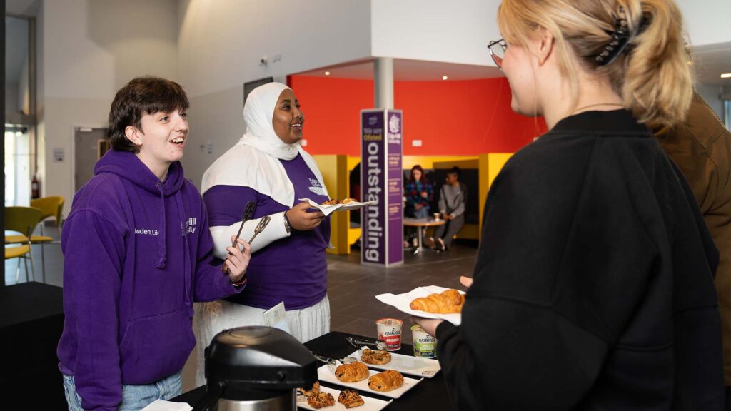 students attending the weekly free commuter breakfast in creative edge