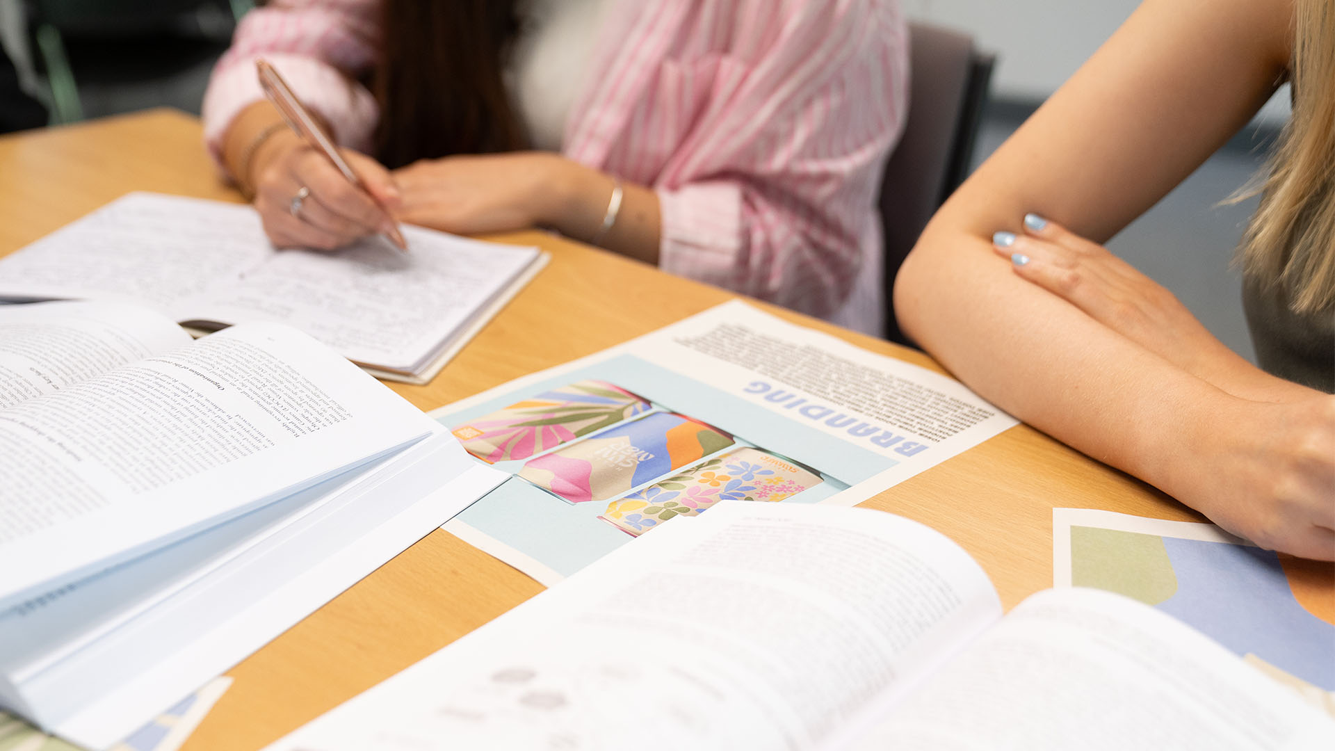 Marketing students working on a branding project